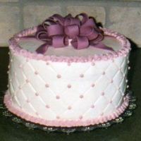 Pink Bow WASC torted & filled w/blackberry bc. Fondant bow.