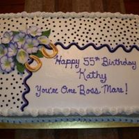 55Th Birthday Cake Chocolate cake using WASC ingredients and adding melted chocolate. BC frosting, RI flowers and fondant horse shoes.