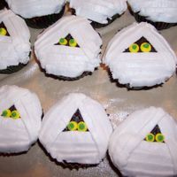 Mummy Cupcakes This is a picture of the mummy cupcakes that I made for my nephews halloween party at school.