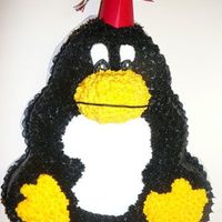 Penguin Grad This cake was made from a teddy bear pan. I also made the cap myself.