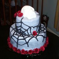 Skull And Roses Thanks to Lauri Ditunno from Cake Alchemy for permission to replicate her cake design. Marbled fondant two tier cake (red velvet and...