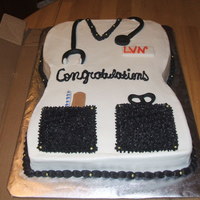 Scrub Top B/c w/ b/c frosting, w/ fondant accents this cake was done for a co-workers daughter who just graduated from nursing school.