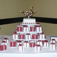 Mini Gift Box Cakes Boy did I ever calculate this one wrong! I didn't charge nearly enough for the amount of work & supplies put in to this. I built...