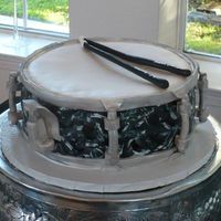 Guyton's Snare Here was the groom's cake for a professional drummer - the black/white detailing on the side resembled his favorite snare. I added the...