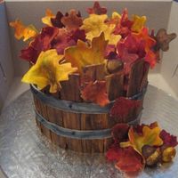 Bucket Of Leaves I donated this cake for a fundraiser in memory of a friend of my sisters, who passed away from Lung Cancer. It is a Red velvet cake with...