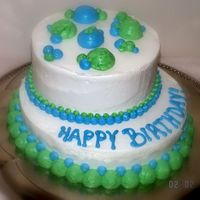 Tom's Birthday 6" and one layer 8" covered in buttercream. Made for my husband's birthday. Practicing trying to get my icing smooth! Thanks...