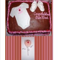 Erin's Baby Shower Chocolate cake w/choc bc. sugar ladybugs and mmf fondant onesie and booties. (removed the tissue from the shoe before delivery)Thank you...