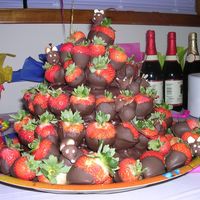 Chocolate Dip Strawberry /cake Another birthday for a friend that love's strawberrys.First you will find that there is a 3 layer cake.First layer is white second is...