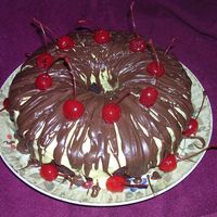 Well Thats The Cherry On Top Of The Cake! This is a fun way to do another bunt cake, inside you will find whip cream and cherrys as a filling (yummy) The iceing is done in 2 flavors...