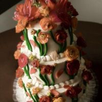 Fall Beauty All butter cream icing with fondant leaves and fresh flowers