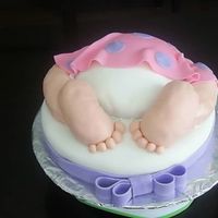 Baby Bottom This was my first time using fondant, I made this for my sisters baby shower, the legs and feet are made from rice crispies covered in...