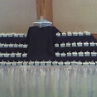 Individual Glass Slipper Pillows One large glass slipper pillow set amongst 120 individual servings each set with their own glass slipper. Strawberry cakes dressed in blue...