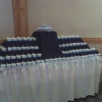 Cinderella Glass Slipper Pillows Large glass slipper pillow set amongst 120 individual serving pillows each set with their own glass slipper. Strawberry cakes decorated in...