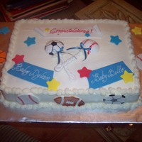 Baby Sports Rattle Vanilla cake, buttercream icing, fondant details