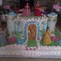 Disney Princess This is a full triple chocolate fudge sheet cake. The round cake is white all buttercream. The door and the leaves are MMF colored by hand...