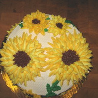 Yellow Sunflower Cake Carrot cake with buttercream icing. I saw this on Peggy Weaver's website.