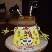P2177647.jpg I made this for my sons 4th Birthday. I stacked 1/2 and 1/4 sheet cake. For his arms and legs I made photo copies and lamenated them. I put...