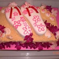 Flip Flop Birthday I used real orchids for the flowers and real seashells. The flowers on the fondant flip flops I freehanded with piping gel. The sand was...
