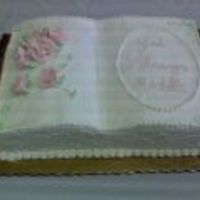 Bible Cake I made this cake for a baptism, is a yellow sour cream cake with white chocolate ganache and raspberry jam filling, frosted with pastry...