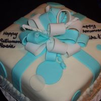 Anniversary / Retirement Cake This is a WASC cake with raspberry filling. She wanted it to be a retirement cake for her mom and a 10 year anniversary for her brother. So...