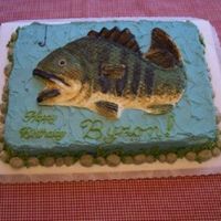 Bass Fisherman's Cake 1/2 sheet covered in buttercream with molded candy fish