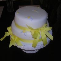 Mini Bouqets Stacked, fondant covered rounds with piped mini bouqets and ribbon embellishment for bridal shower.