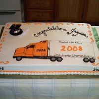 Truckin' All buttercream. Chocolate cake. Full sheet. I messed up on the trailer, it's too short. It looks a little out of balance. The...