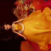 Princess Bell doll pan with a whole doll put into the cake. this was very fun, for my daughters 3rd bday.i got my inspiration here