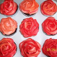 Flower Cupcakes To Go With Mermaid Cake For all the non chocolate lovers (WHAT?) coming to the party, I made some vanilla cupcakes and frosted them in colors to match the flowers...