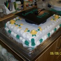 Brothers College Grad Cake So I'm a little happier with this one - not as many problems as the anniversary cake. Chocolate cake 11 x 15 with chocolate 6"...