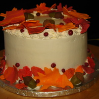 Autumn Leaves Cake Sugarpaste autumn leaves on an 8" 5 layer chocolate cake with vanilla buttercream.