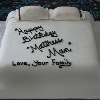 Happy Birthday Mattress Man Mattress cake with buttercream 'mattress' cover and fondant blanket and pillows