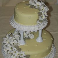 Wilton Level Iii Final Cake Butter Cake with MMF. Royal Icing Lillies and Fondant Roses and Leaves.