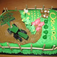 John Deere Cake This is for my son's birthday..the cake is buttercream with fondant accents. I don't work well with buttercream so i don't...