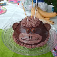 Monkey Cake I think i got this idea from Martha Stewart. Chocolate cake, chocolate frosting, The ears are a cupcake cut in half. For my daughter's...