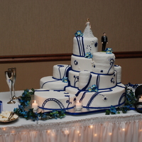Puzzle Wedding Cake This was my wedding cake May 09 called a puzzle lots of dummy cakes since there were only 40ish people at my wedding had to be delivered 7...