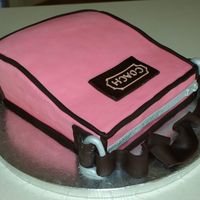Coach Purse My brothers girlfriend is a purse fanatic and she LOVES the color pink...so I made this cake for her 21st birthday last year. The cake was...