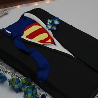 Superman Grooms Cake Suit my husbands grooms cake superman tuxedo and he wanted a character pan superman I said r u kidding me I OWN A CAKE SHOPI also suprised him...