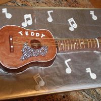 Guitar Cake This is my first attempt at cake decorating. I was trying to replicate my son's favorite toy for his 2nd birthday party. Considering...