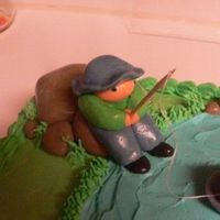 P1030445.jpg My first fondant character!! I used luvtodecorate's fishing cake as an example! This was so much fun!!!