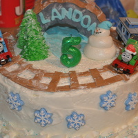 Thomas The Train Birthday This cake was for my son's 5th birthday. He wanted Thomas in the snow so this is what I came up with. I didn't smooth the icing...
