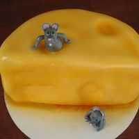 Cheese Cake Quiet Sunday, time to fool around. White pound with Strawberry cream filling, B/C icing, fondant cheese (airbrushed) and mice. Another...