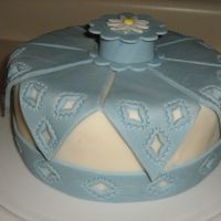 Fondant/gumpaste Display Cake I made this display cake for the front window of the store I teach at. It's from Wilton's Fondant and Gumpaste book. The "...