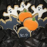 Halloween Bouquet Ghosts, pumpkins and a headstone. Penny's cookie recipe with royal icing.