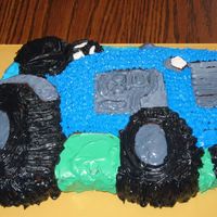 New Holland Tractor my first cake ever! made if for my dad who works for New Holland Tractors and wanted "anything but a green tractor!"