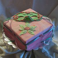 Masquerade Cake I'm not good at multi-tiered pieces of art like you all are (there are many true artists out there!!!) but I try. Simple yellow cake...