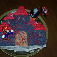 Super Mario Castle Cake Yes, its Mario! He reached Princess Peach's Castle just in time for the birthday party! Wilton Castle Cake Pan