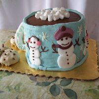 Hot Cocoa Mug This cake is red velvet and white layered. It is coated with cream cheese icing. The hot chcolate is choc. frosting, the cookies are...