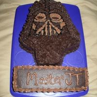 Darth Vader's Master Announcement Made out of one 13x9 pan, I traced the face of a photo of Darth Vader, enlarged it on the photocopier until fit the width of the cake, and...
