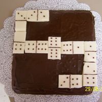 Dominos This was a chocolate cake with chocolate icing and candy melts made to look like dominos.